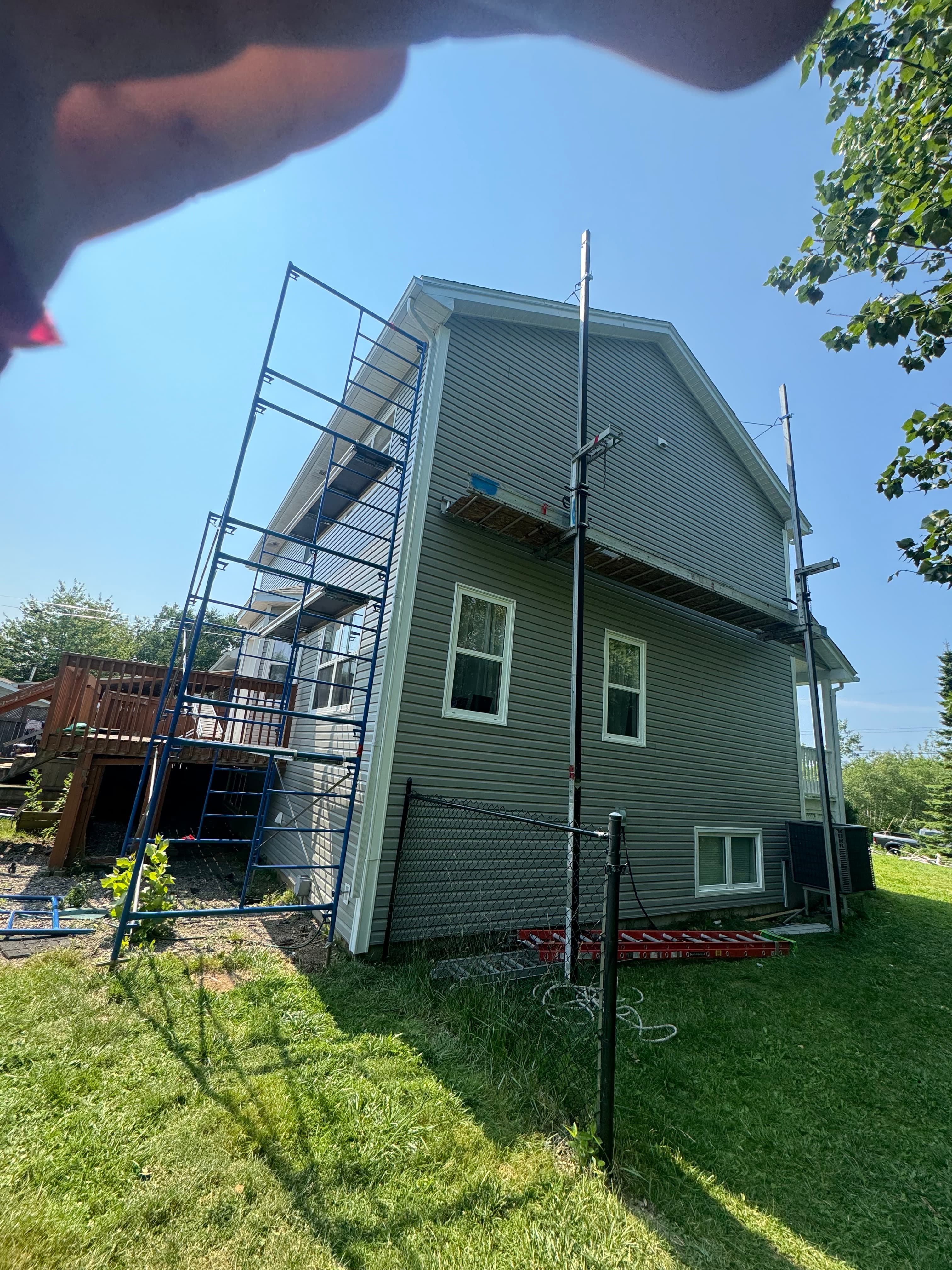 Completed coastal renovation with durable materials.