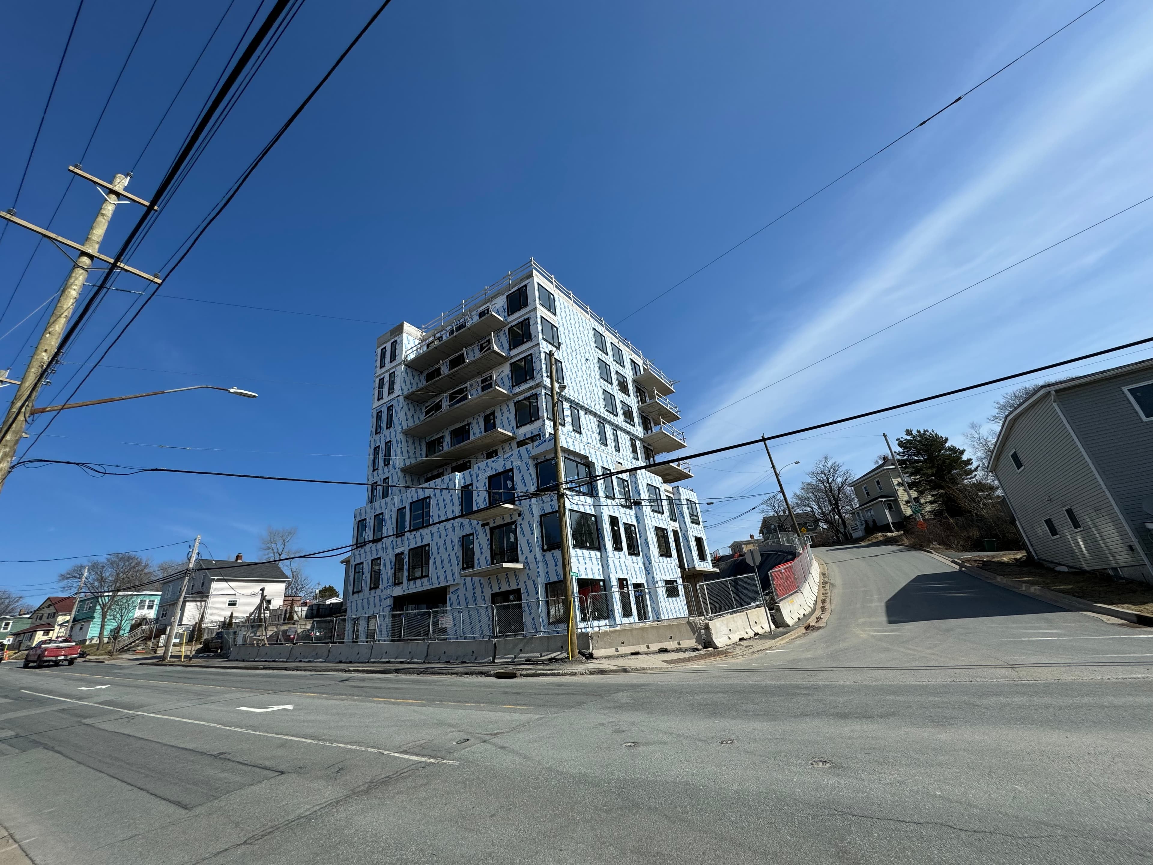 Mid-rise exterior work underway on a commercial multi-unit project in Halifax.
